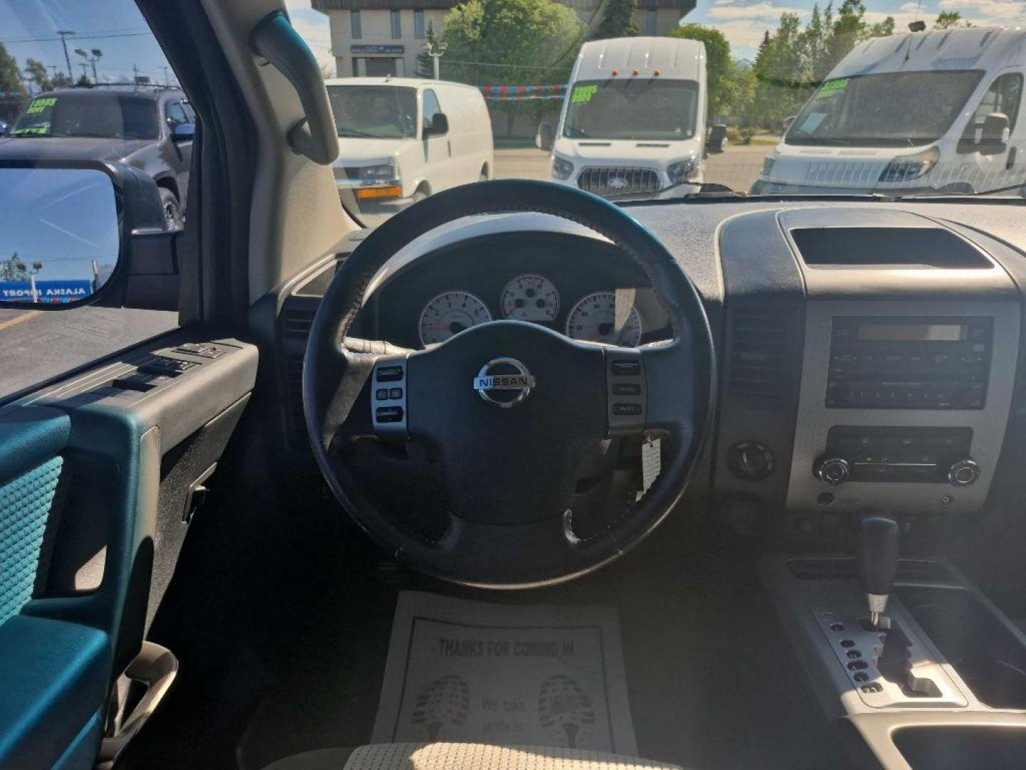 2012 BLACK NISSAN TITAN S (1N6BA0EC9CN) with an 5.6L engine, Automatic transmission, located at 929 East 8th Ave, Anchorage, AK, 99501, (907) 274-2277, 61.214783, -149.866074 - Photo#4