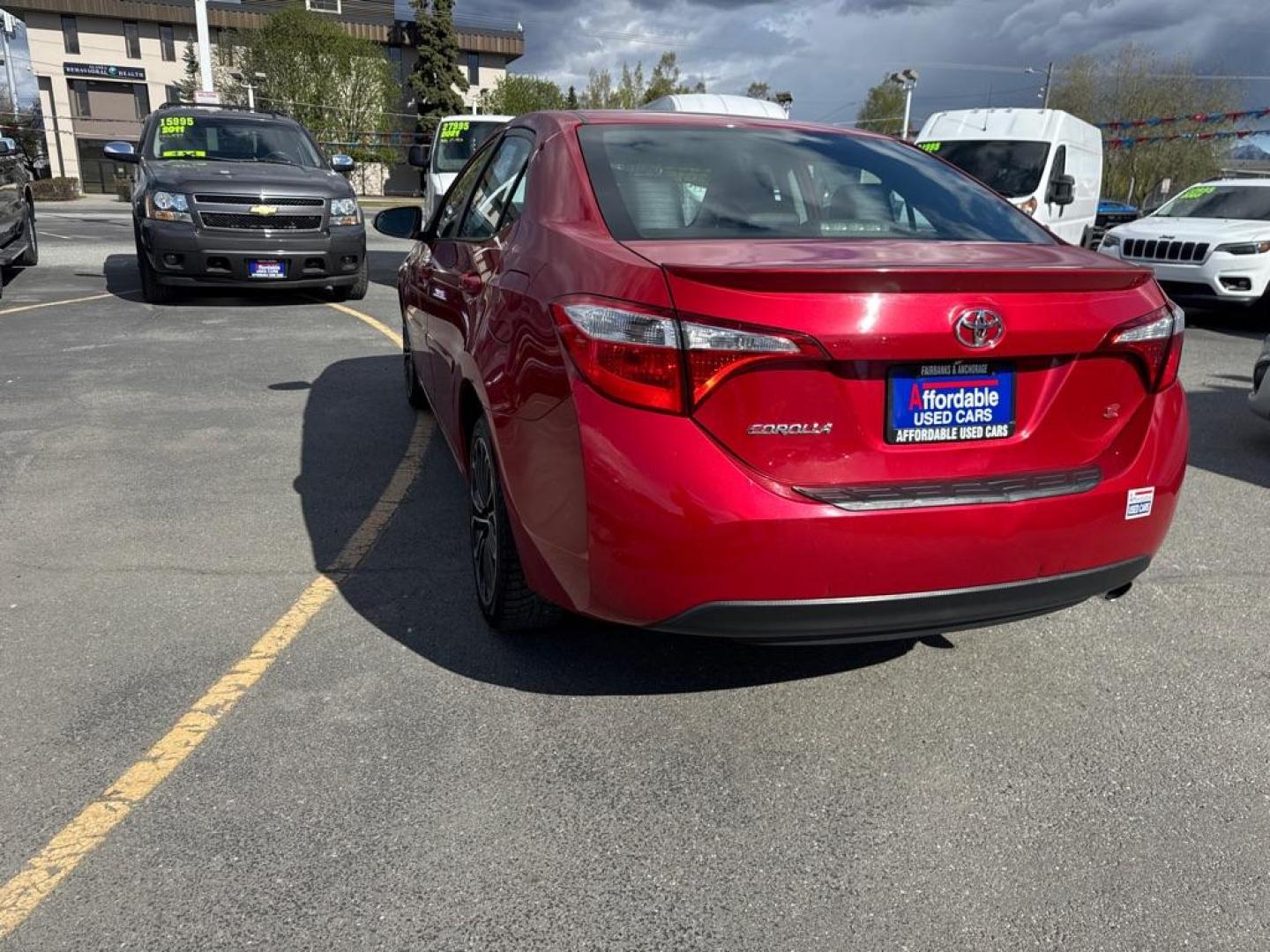 2015 RED TOYOTA COROLLA L (2T1BURHE7FC) with an 1.8L engine, Automatic transmission, located at 929 East 8th Ave, Anchorage, AK, 99501, (907) 274-2277, 61.214783, -149.866074 - Photo#4