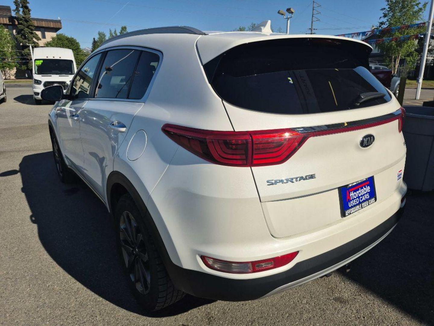 2018 WHITE KIA SPORTAGE EX (KNDPNCAC6J7) with an 2.4L engine, Automatic transmission, located at 929 East 8th Ave, Anchorage, AK, 99501, (907) 274-2277, 61.214783, -149.866074 - Photo#2