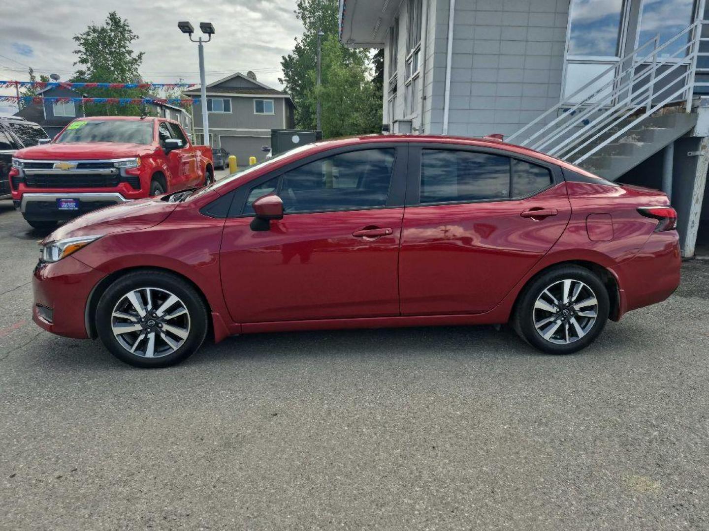 2024 MAROON NISSAN VERSA SV (3N1CN8EV6RL) with an 1.6L engine, Continuously Variable transmission, located at 929 East 8th Ave, Anchorage, AK, 99501, (907) 274-2277, 61.214783, -149.866074 - Photo#1